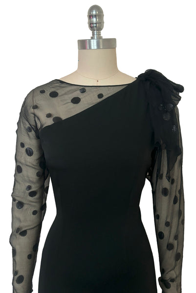 Bodice front view of 1990s vintage black polka dot silk chiffon and crepe asymmetrical dress by Giorgio Beverly Hills, size small to medium. Showing the sheer one shoulder design with shoulder bow.