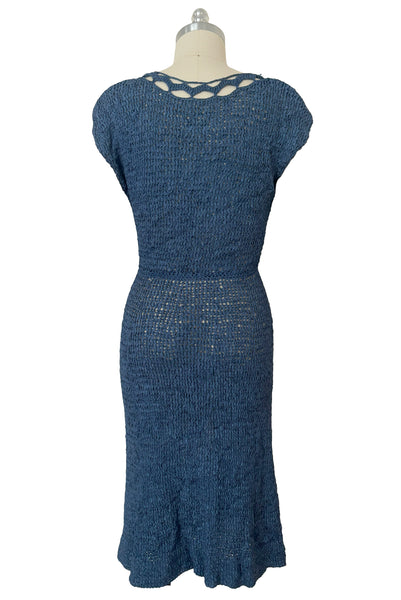 Back view of 1950s vintage periwinkle rayon ribbon crochet dress, medium to extra large.