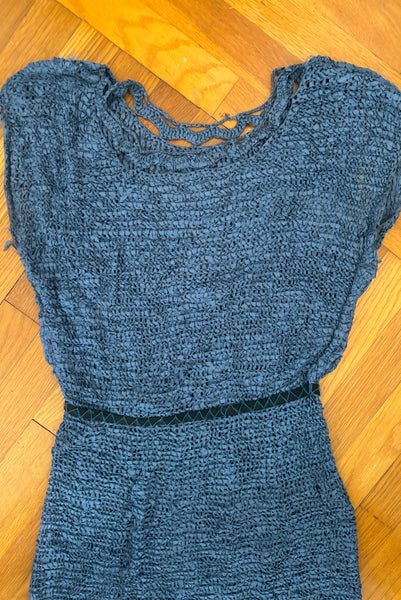 Interior detail view of 1950s vintage periwinkle rayon ribbon crochet dress, medium to extra large. Showing how the dress is put together and the elastic waist.