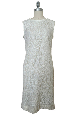 Front view of 1960s vintage white corded lace sleeveless sheath dress by Jonathan Logan, size small to medium.