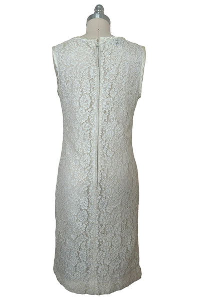 Back view of 1960s vintage white corded lace sleeveless sheath dress by Jonathan Logan, size small to medium.