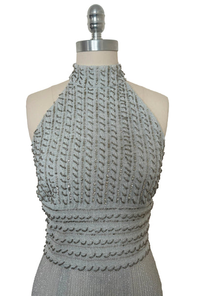 Bodice front view of 1960s silver Lurex and white beaded evening gown by Mignon, medium to large. Showing the beaded and sequined halter neckline.