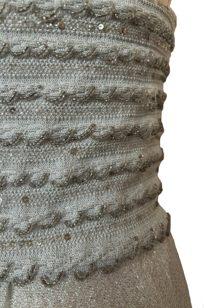 Bodice waist front detail view of 1960s silver Lurex and white beaded evening gown by Mignon, medium to large. Showing some areas of loosened beading and sequins that have lost their silver color.