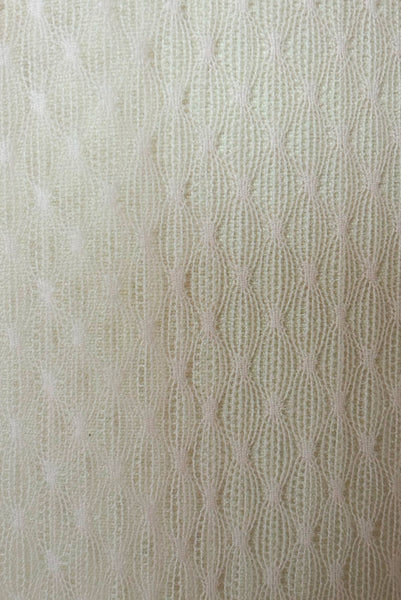 Fabric detail view of 1990s vintage pale pink mesh tie pajama top and pants lingerie set, size small, medium, large.