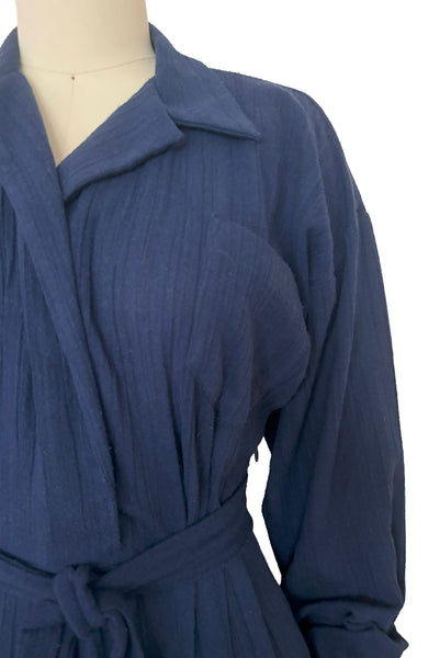 Bodice detail view of 1980s vintage bright navy blue long sleeve midi shirtdress by Norma Kamali, size small to medium.
