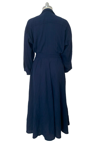Back view of 1980s vintage bright navy blue long sleeve midi shirtdress by Norma Kamali, size small to medium.