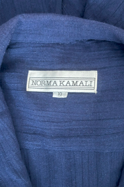 Interior detail view of 1980s vintage bright navy blue long sleeve midi shirtdress by Norma Kamali, size small to medium. Showing the Norma Kamali label and size 10 tag.