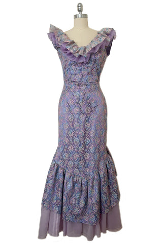 Front view of 1980s vintage ruffled lavender and multicolor lace mermaid dress, vintage theatre costume, extra small to small.