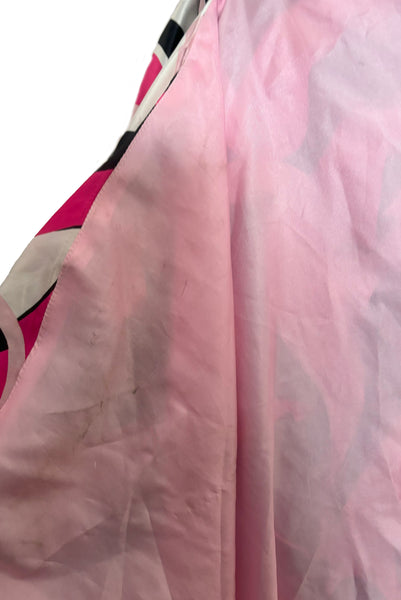 Interior detail view of 2000s y2k vintage pink, black, white, and red psychedelic satin strapless ruffled prom or quinceañera gown with train, extra small to small. Showing the underside of the train with stains.