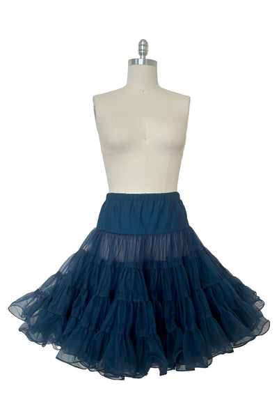 Front view of 1970s vintage dark blue nylon adjustable petticoat by Malco Modes, small, medium, large.