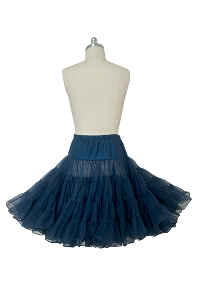 Back view of 1970s vintage dark blue nylon adjustable petticoat by Malco Modes, small, medium, large.