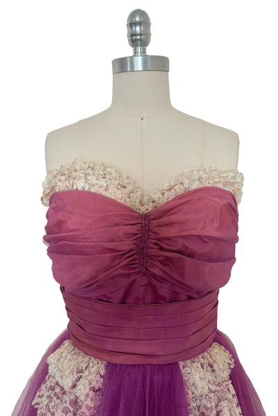 Bodice front view of as is 1950s vintage purple tulle and cream lace strapless ruffled evening dress, size extra small to small.