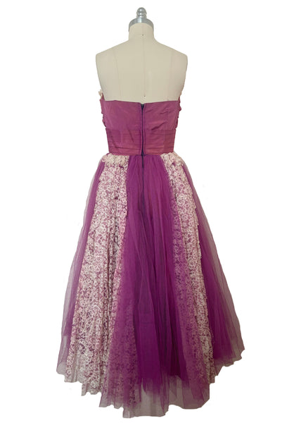 Back view of as is 1950s vintage purple tulle and cream lace strapless ruffled evening dress, size extra small to small.