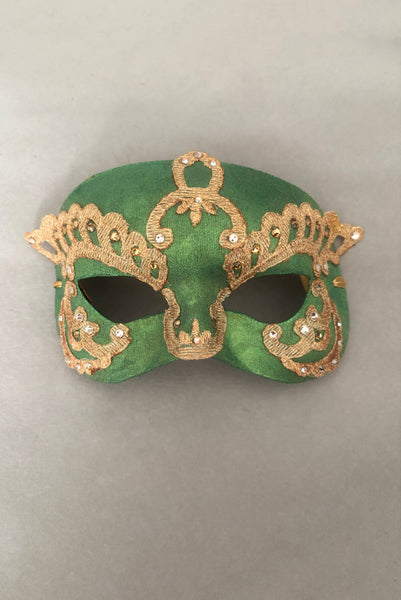 Vertical flat view of 1990s gold Lurex lace, gold Swarovski crystal, and metallic green painted half mask with gold satin ribbon ties.