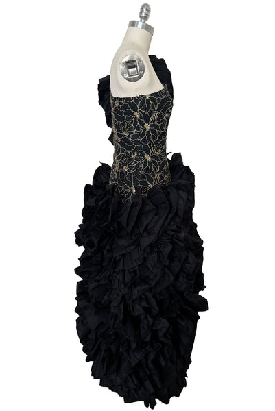 Side view of 1980s vintage black & gold floral embroidered one shoulder ruffled silk evening dress, size extra small to small.