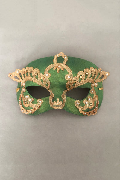 Vertical flat view of 1990s gold Lurex lace, gold Swarovski crystal, and metallic green painted half mask with gold satin ribbon ties.