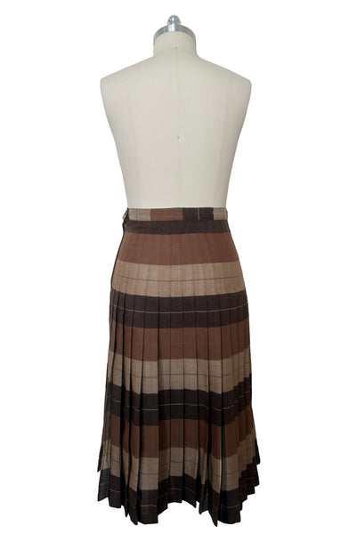 Back view of 1970s vintage reversible black, tan, cream, and green wool plaid pleated midi skirt by Charlotte Ford for Classique Collection, size medium to large. Showing the lighter side.