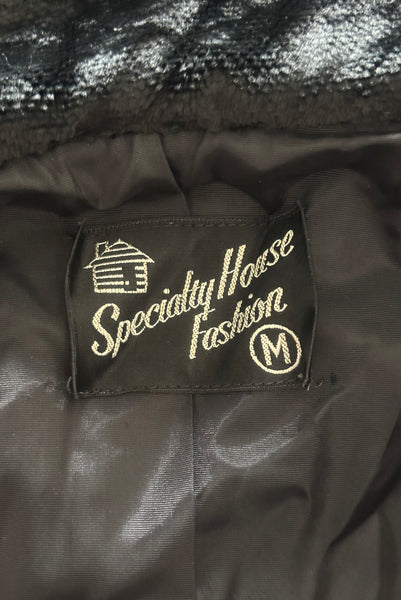Interior detail view of 1950s vintage black faux Persian lamb embossed velvet jacket, by Specialty House Fashion, size small to medium. Showing the Specialty House Fashion, size M label.