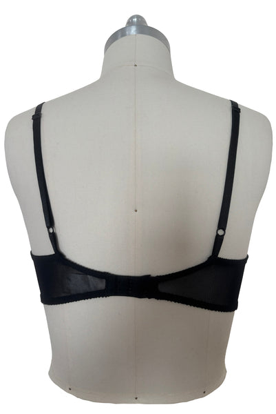 Back view of 2000s vintage y2k goth pin-up lingerie black nylon Lycra wet look bra by Bernie Dexter for Lucy B, size medium to large.