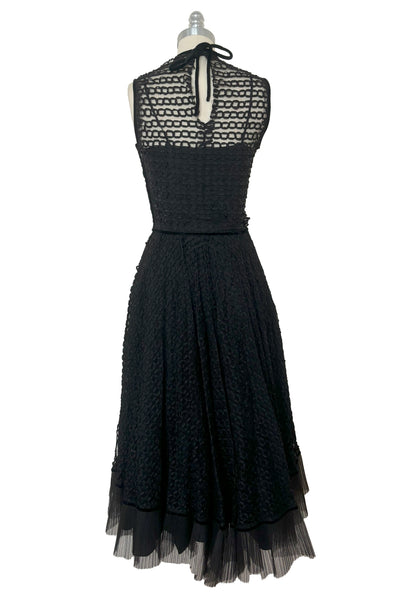 Back view of 1950s vintage sleeveless New Look style black tulle silk ribbon dress by Dance Time, size extra small to small.