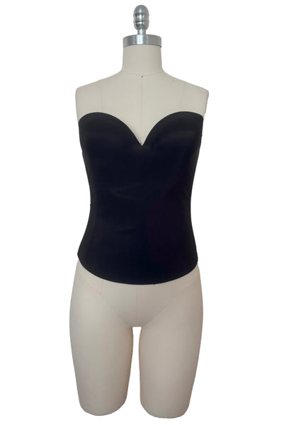 Front view of 2000s y2k vintage deadstock new with tags black seamless underwire strapless longline bra by Felina, size 36B.