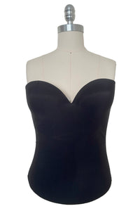 Front view of 2000s y2k vintage deadstock new with tags black seamless underwire strapless longline bra by Felina, size 36B.