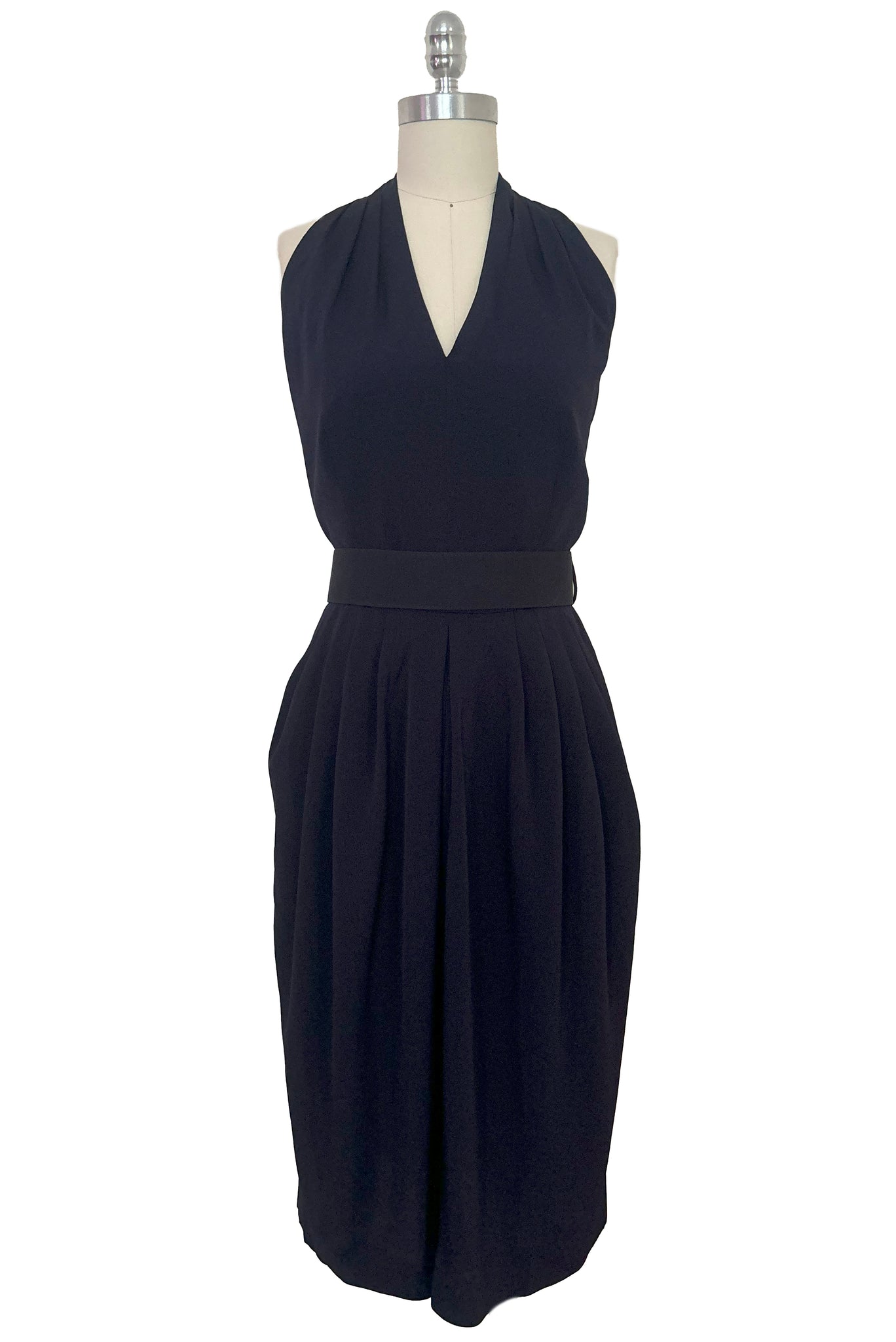 Front view of 1990s vintage navy blue crepe V-neck, keyhole back dress with draped skirt and belt by BB Collections, medium to large.
