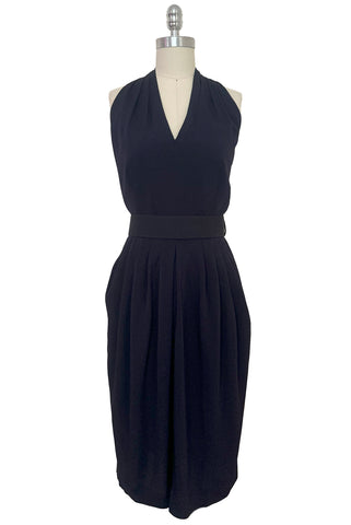 Front view of 1990s vintage navy blue crepe V-neck, keyhole back dress with draped skirt and belt by BB Collections, medium to large.