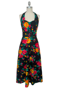 Front view of vintage 1990s black, pink, green, and yellow floral halter dress with matching belt by Concepts, extra small to small.