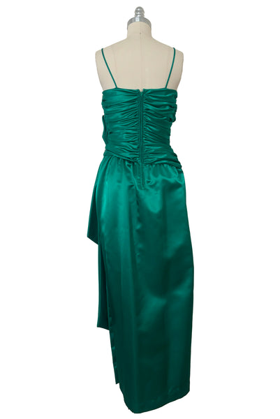 Back view of 1980s vintage emerald green satin rhinestone trimmed ruched evening dress, by Lillie Rubin, size extra extra small to extra small.