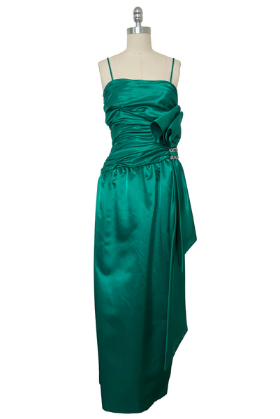 Front view of 1980s vintage emerald green satin rhinestone trimmed ruched evening dress, by Lillie Rubin, size extra extra small to extra small.
