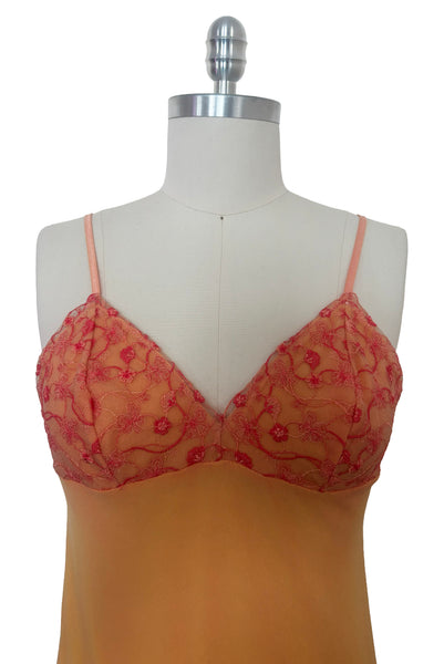 Bodice front view of 2000s y2k vintage as is pink floral embroidered orange and peach drop waist mesh Enya Chemise by Cosabella, size large to extra large. Showing the pink floral embroidered sweetheart bust, adjustable straps, and empire waist.