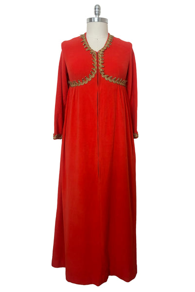 Front view of 1960s  vintage orange fleece zip front housecoat w/ gold metallic braid by Periphery, size medium to large.