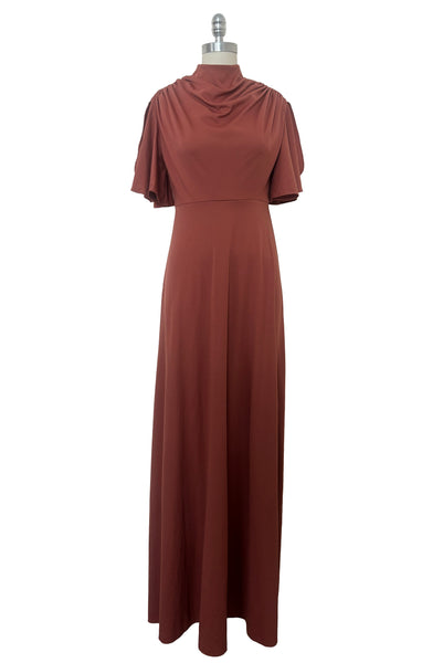 Front view of 1970s vintage new with out tags terra cotta brown high neck knit maxi bridesmaids dress by Lorrie Deb, size small to medium.