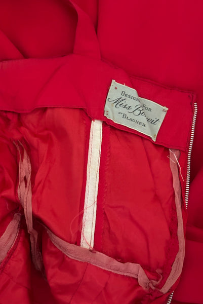 Interior detail view of 1960s vintage draped raspberry pink silk chiffon cocktail dress by Miss Bonwit, size extra small to small. Showing the Miss Bonwit by Blauner label.