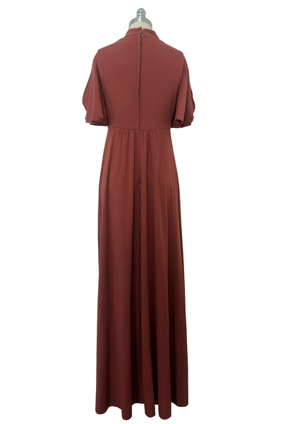 Back view of 1970s vintage new with out tags terra cotta brown high neck knit maxi bridesmaids dress by Lorrie Deb, size small to medium.