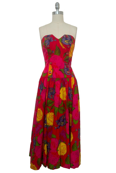 Front view of 1990s vintage red, pink, yellow, green, and purple floral strapless dress by AJ Bari, size small to medium.