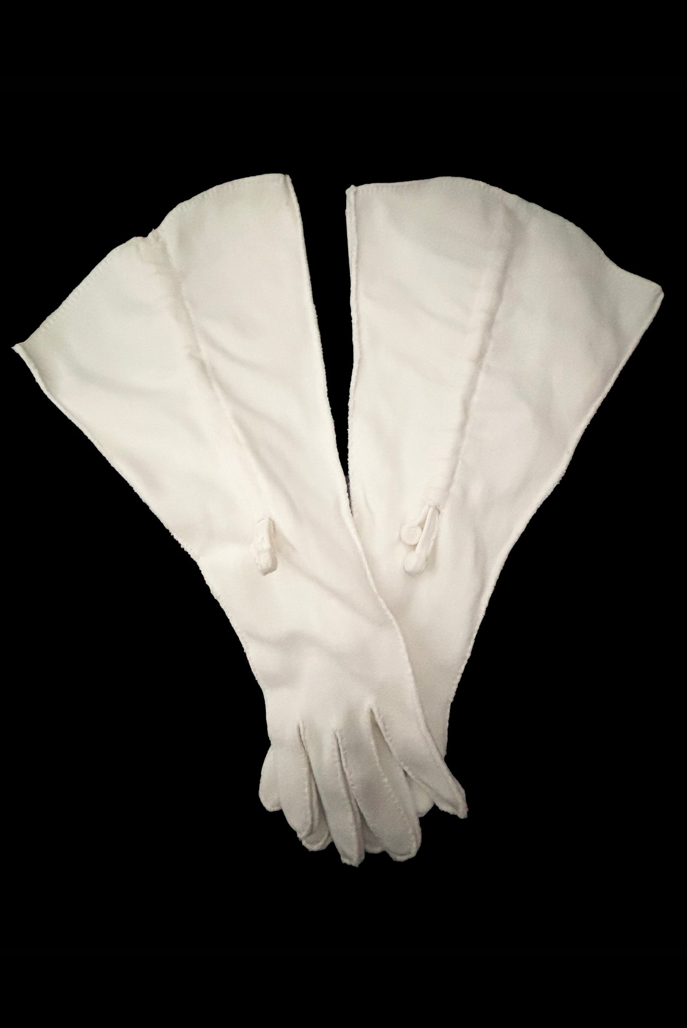 Vertical pair view of 1930s vintage cream mid length gathered tie detail gauntlet gloves, by Picairdy Stitch.