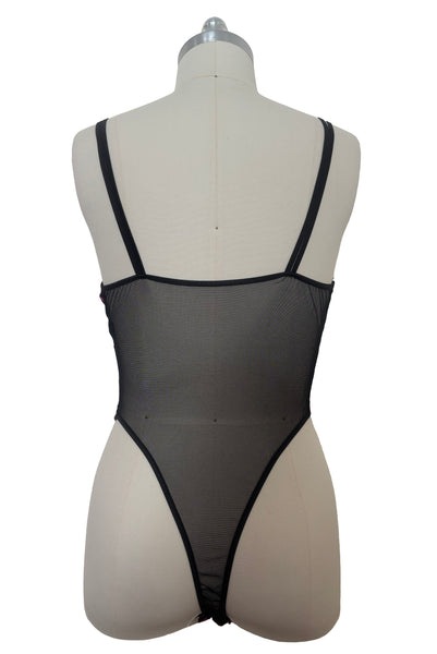 Back view of 1990s vintage black and fuchsia pink embroidered sheer mesh high cut throng bodysuit by Extreme, size medium to large.