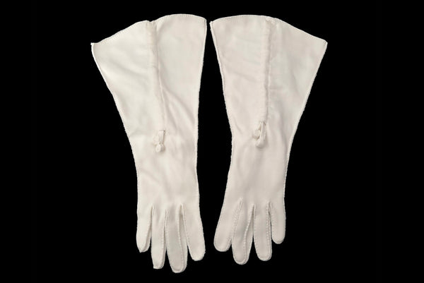 Horizontal front view of 1930s vintage cream mid length gathered tie detail gauntlet gloves, by Picairdy Stitch.