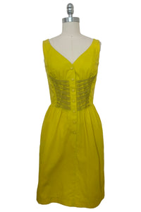 Front view of 1990s vintage chartreuse cotton snap front dress with lacing details by designer Thierry Mugler, size extra small to small.