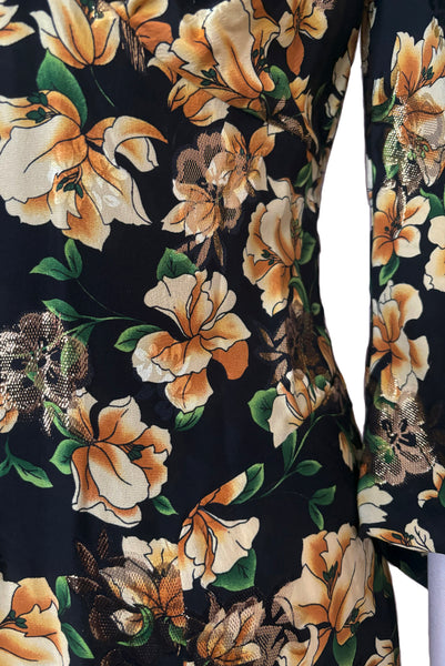 Detail view of vintage 2000s made 1940s reproduction black, yellow, and gold floral silk and lurex evening dress, size medium to large. Showing the pointed fitted midriff.