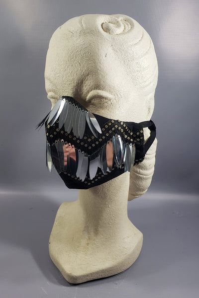The Leslie Courreges Eleanor Mask features black sequins against black embroidery with silver fringe sequins.
