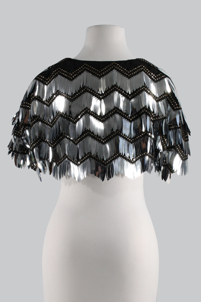 The Leslie Courreges Eleanor Bolero features black sequins against black embroidery with silver fringe sequins. 